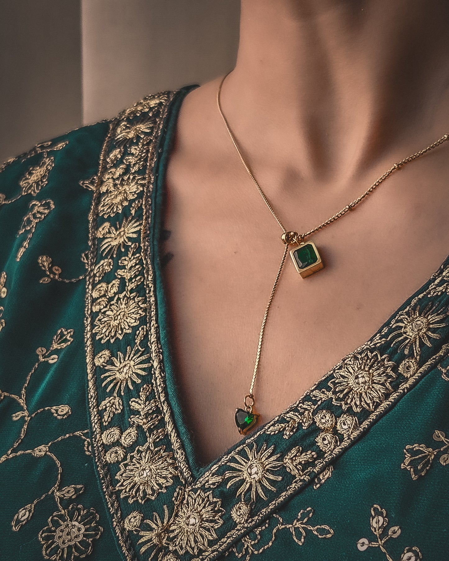 Gold-Tone Necklace with Emerald Gemstone Charms