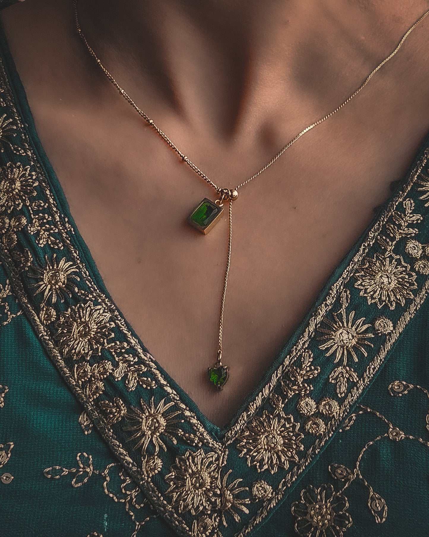 Gold-Tone Necklace with Emerald Gemstone Charms